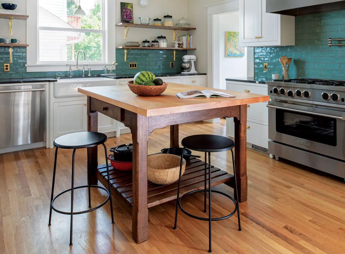 In this large Laurelhurst kitchen Arciform created a center work table inspired by Craftsman-style furniture. 
