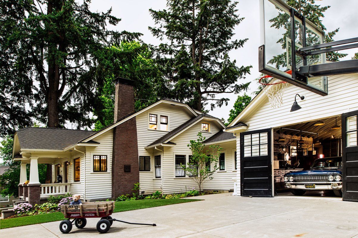 Adjacent to the house, replacing the weather-beaten carport, stands a new garage, designed and built to closely match the existing 1920 Craftsman home. 