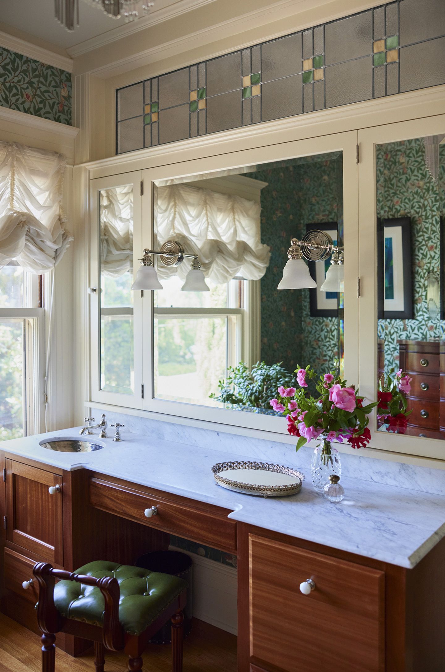 On the other side of the steam shower, the beauty room is the perfect room to get ready for the day or unwind after a leisurely bath.