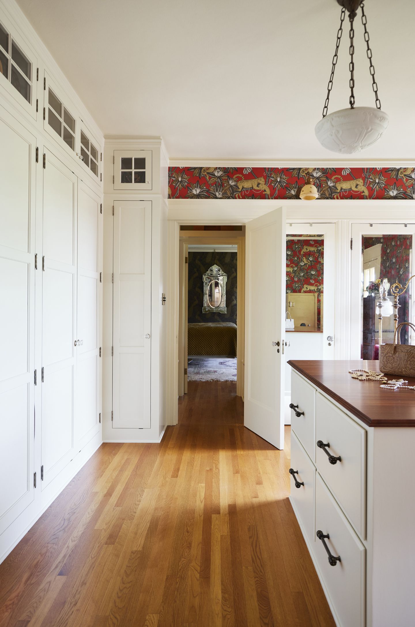 Looking directly into the main bedroom through the dressing room and shoe library.