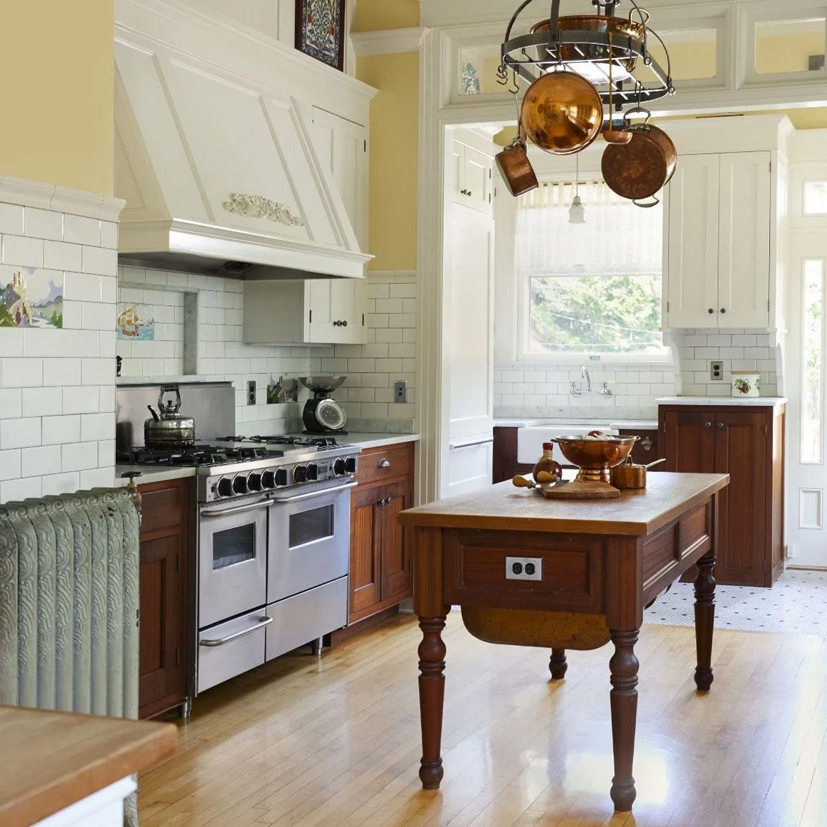 When redesigning the kitchen of a historic NE Portland mansion, Arciform opted for an antique kitchen work table, which they upgraded with electrical and a new work surface. 