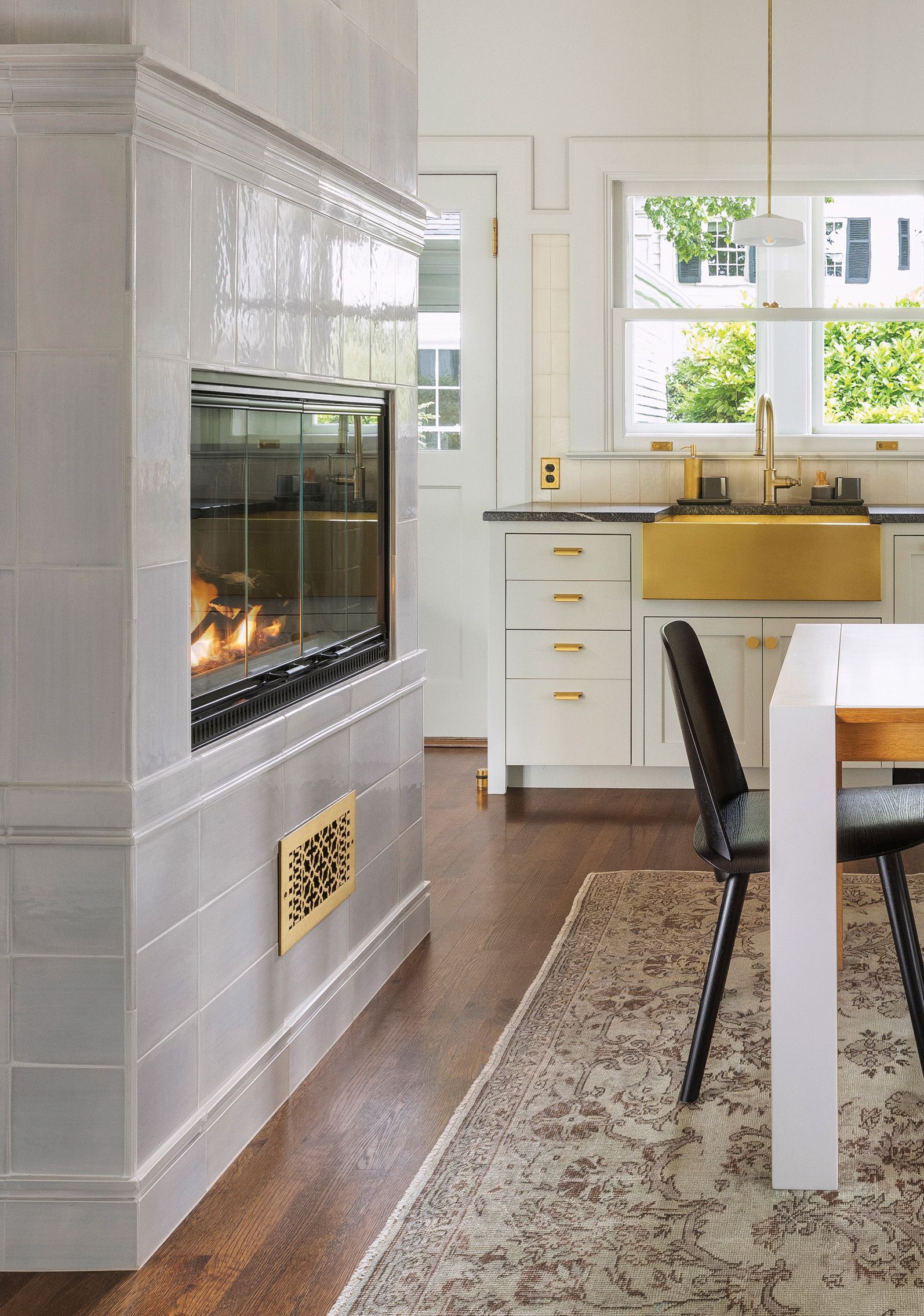 Learn how a fireplace can bring warmth, beauty, and timeless character to your kitchen, along with g