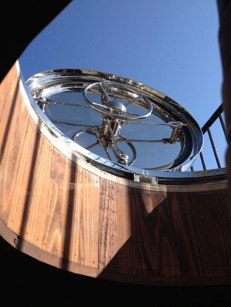 Adventures lie above the stainless steel and glass boat hatch, opening onto a rooftop deck.