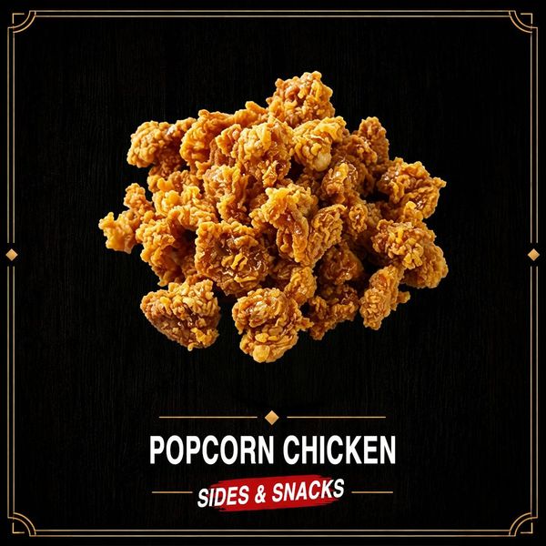 Fried popcorn chicken on a black background with the label “Popcorn Chicken” and “Sides & Snacks”