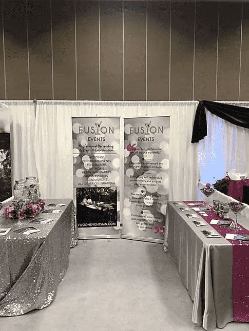 A room with two tables and a sign that says fusion on it.