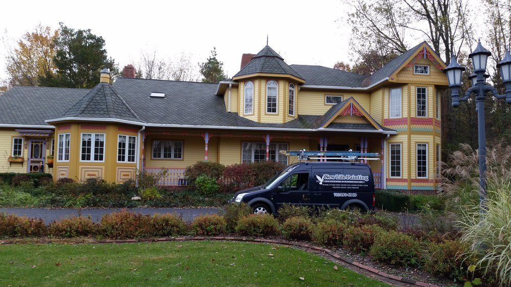 Local Painter — Yellow Painted House in Olympia Fields, IL