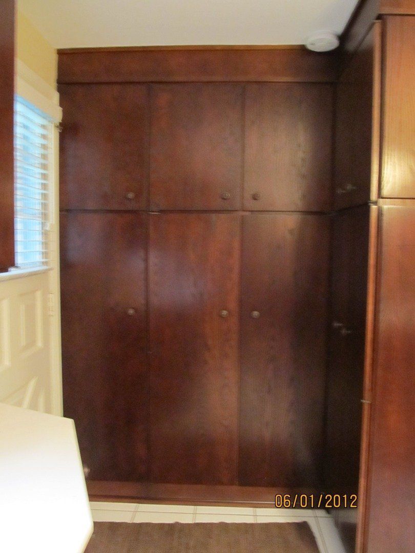 Dark Brown Cabinet — The Tri-State Area — Carriage House II In-Home Restorations