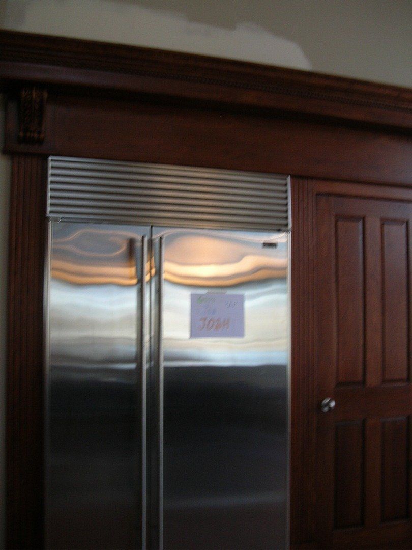 Woodwork in Kitchen with Refrigerator — The Tri-State Area — Carriage House II In-Home Restorations