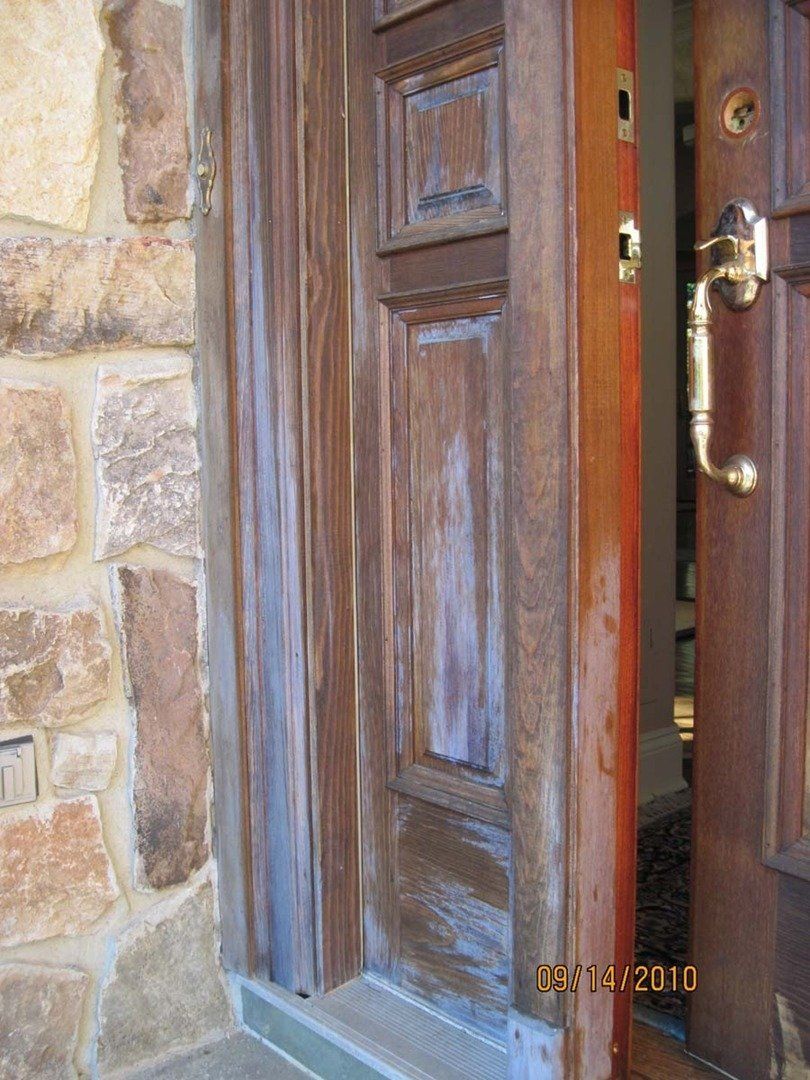 Front Door with Water Damaged — The Tri-State Area — Carriage House II In-Home Restorations