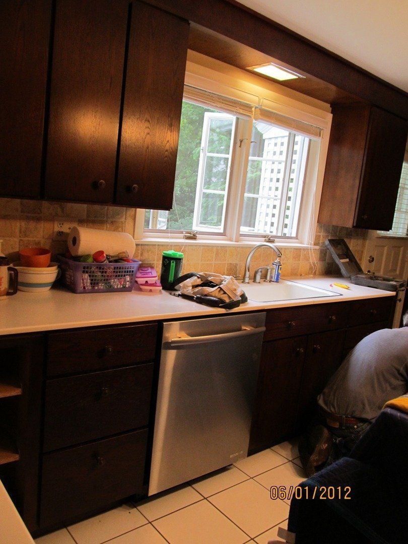 Modern Kitchen with Dark Brown Cabinet — The Tri-State Area — Carriage House II In-Home Restorations