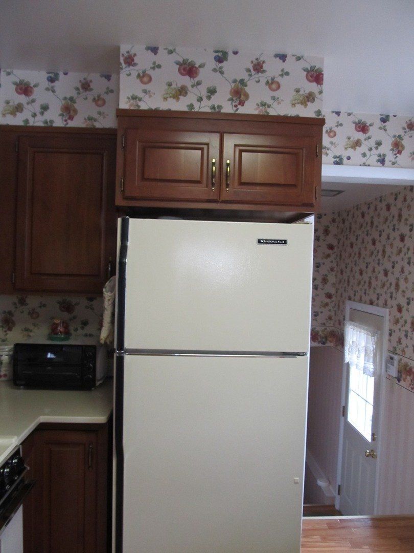 Kitchen with Refrigerator — The Tri-State Area — Carriage House II In-Home Restorations