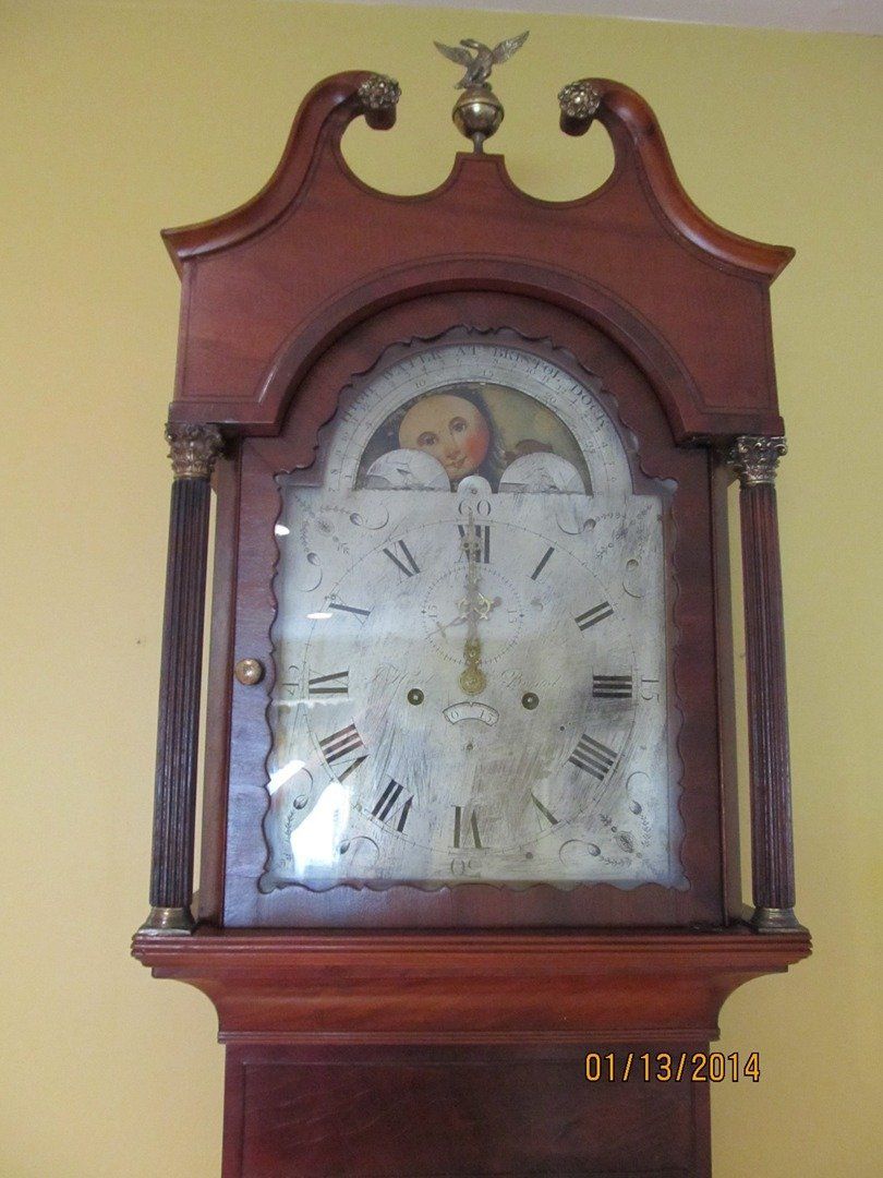 Closeup View of Brown Grandfather Clock — The Tri-State Area — Carriage House II In-Home Restorations