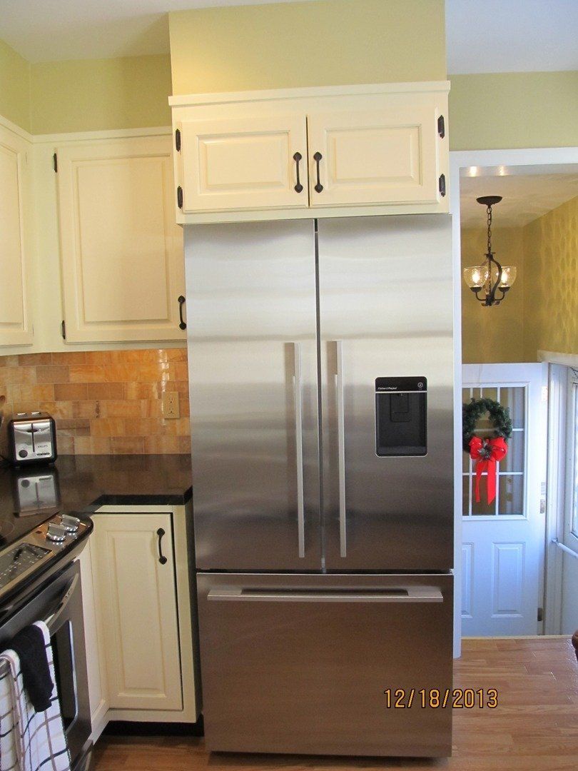 Kitchen with Modern Refrigerator — The Tri-State Area — Carriage House II In-Home Restorations