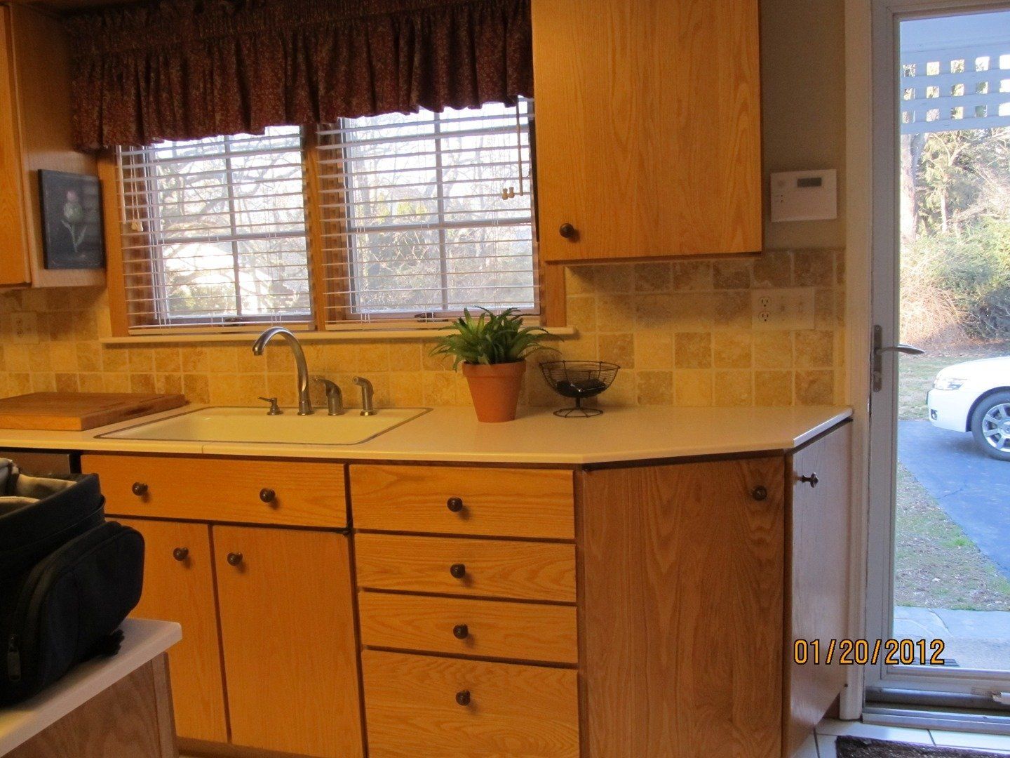 Modern Kitchen with Brown Cabinet — The Tri-State Area — Carriage House II In-Home Restorations