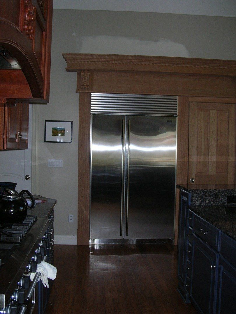 Cherry Woodwork in Kitchen with Refrigerator — The Tri-State Area — Carriage House II In-Home Restorations