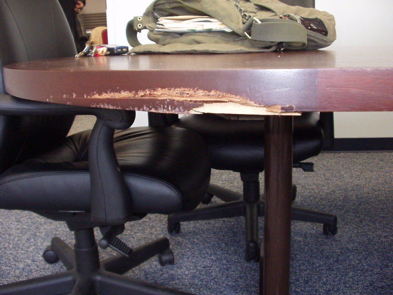 Conference Table Damaged — The Tri-State Area — Carriage House II In-Home Restorations