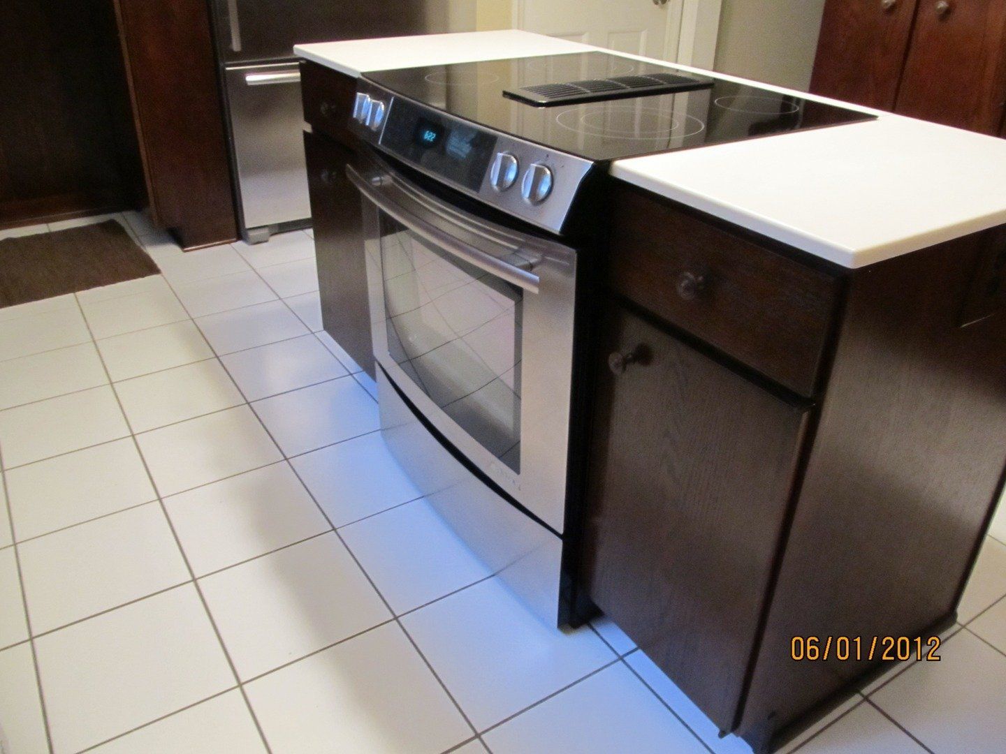 Kitchen with Oven and Dark Brown Cabinet — The Tri-State Area — Carriage House II In-Home Restorations