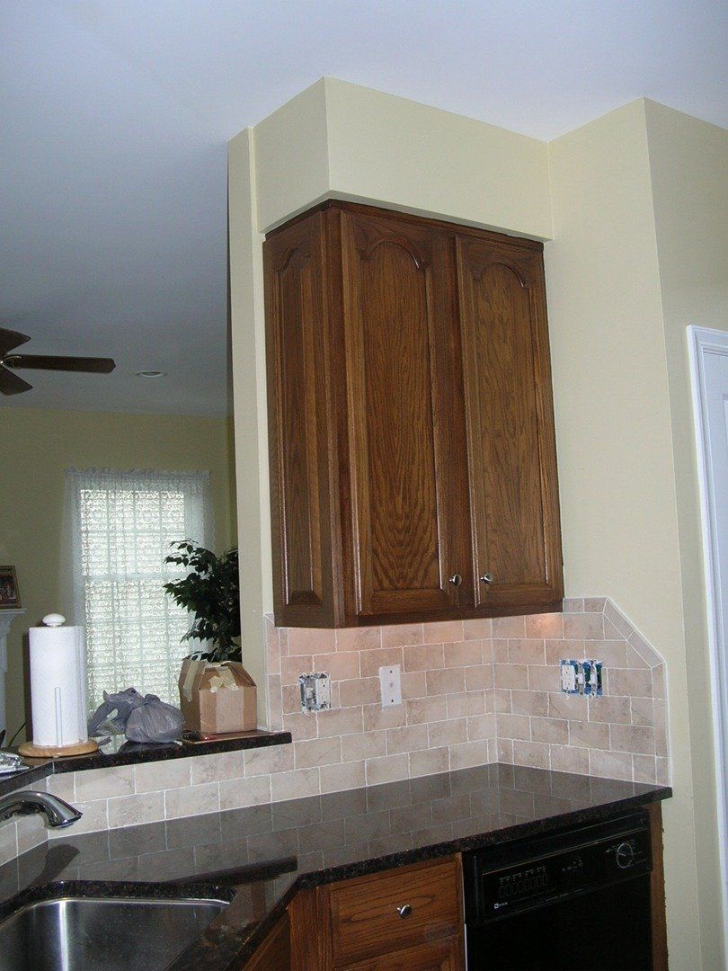Kitchen with Dark Brown Cabinet — The Tri-State Area — Carriage House II In-Home Restorations