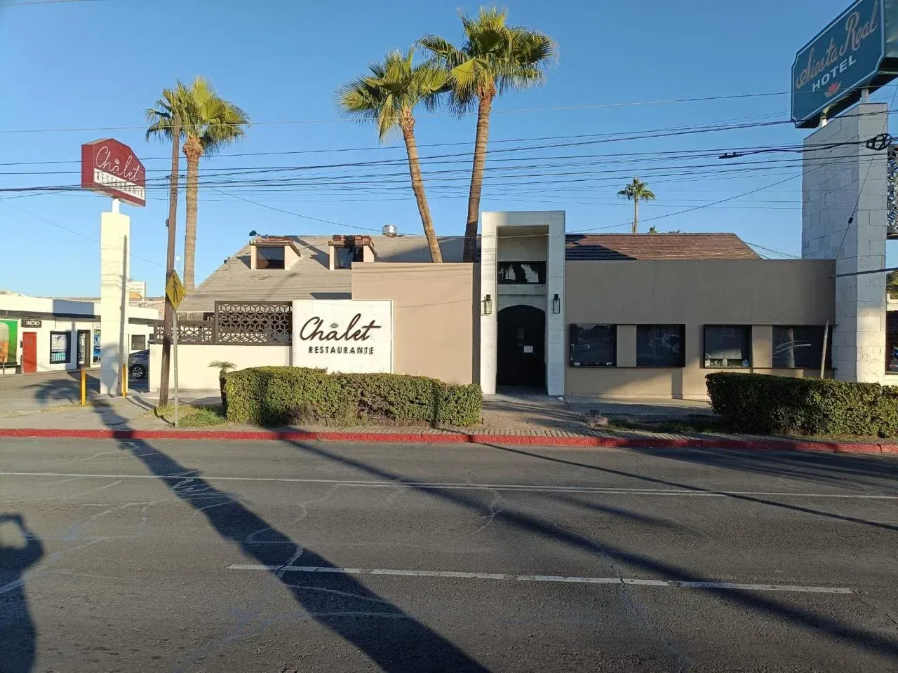 The exterior Siesta Real Mexicana, building with a sign that says chalet on it