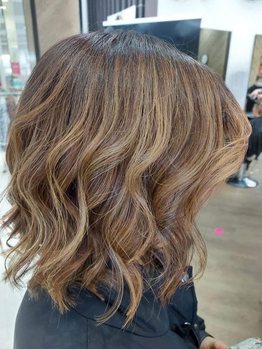 Brown Curled Hair — Hair Salon in Vincentia, NSW