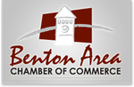 A benton area chamber of commerce logo with a clock tower