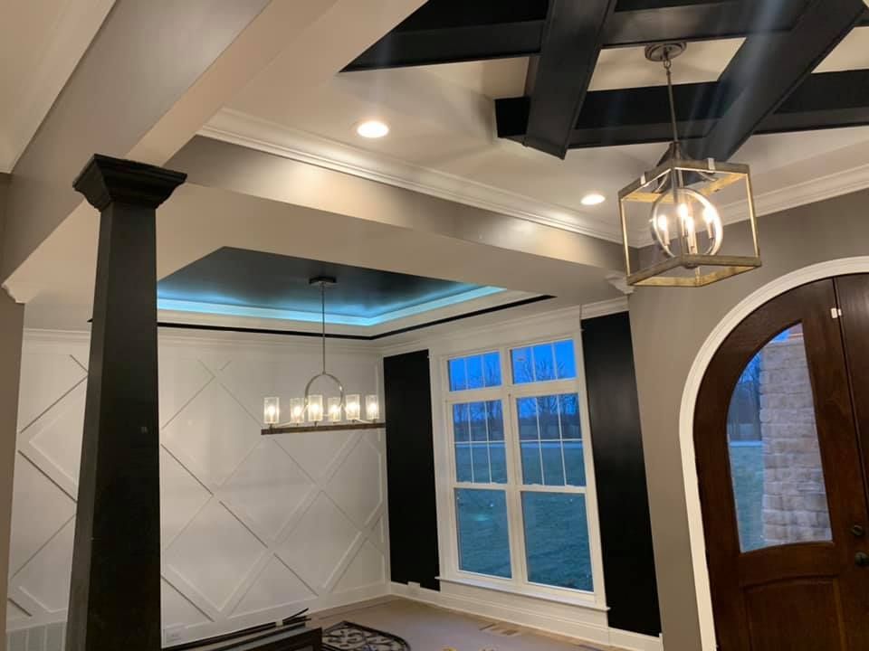 A Living Room With A Chandelier — Louisville, KY — Copper Line Electric