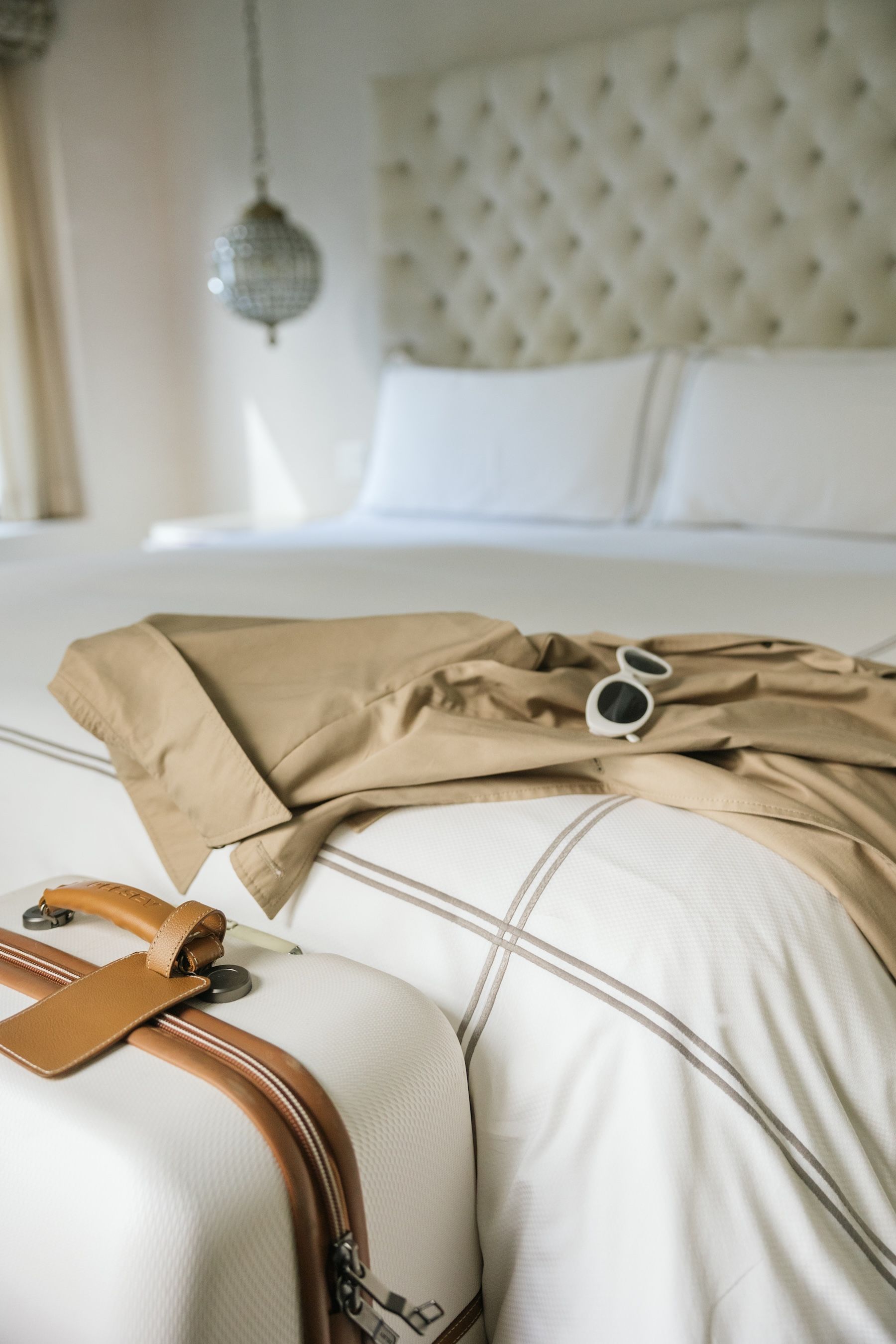 A tall building with a sign theater below.