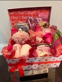 heart box full of care products.