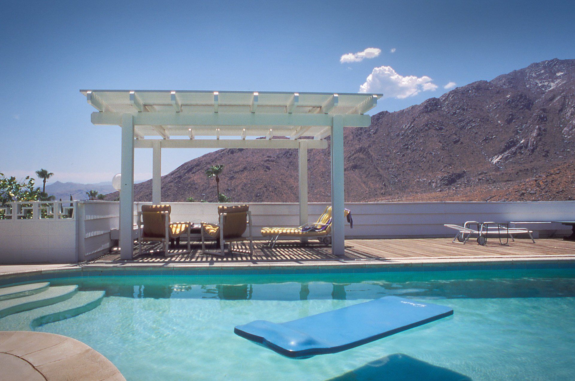 View of patio constructed next to a pool