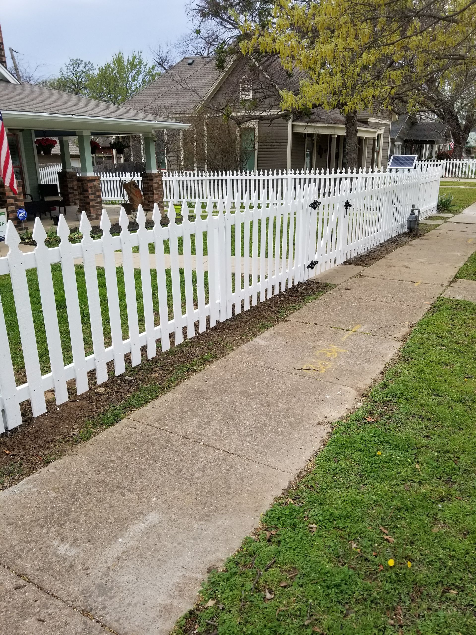 White 4ft tall picket style wood fence