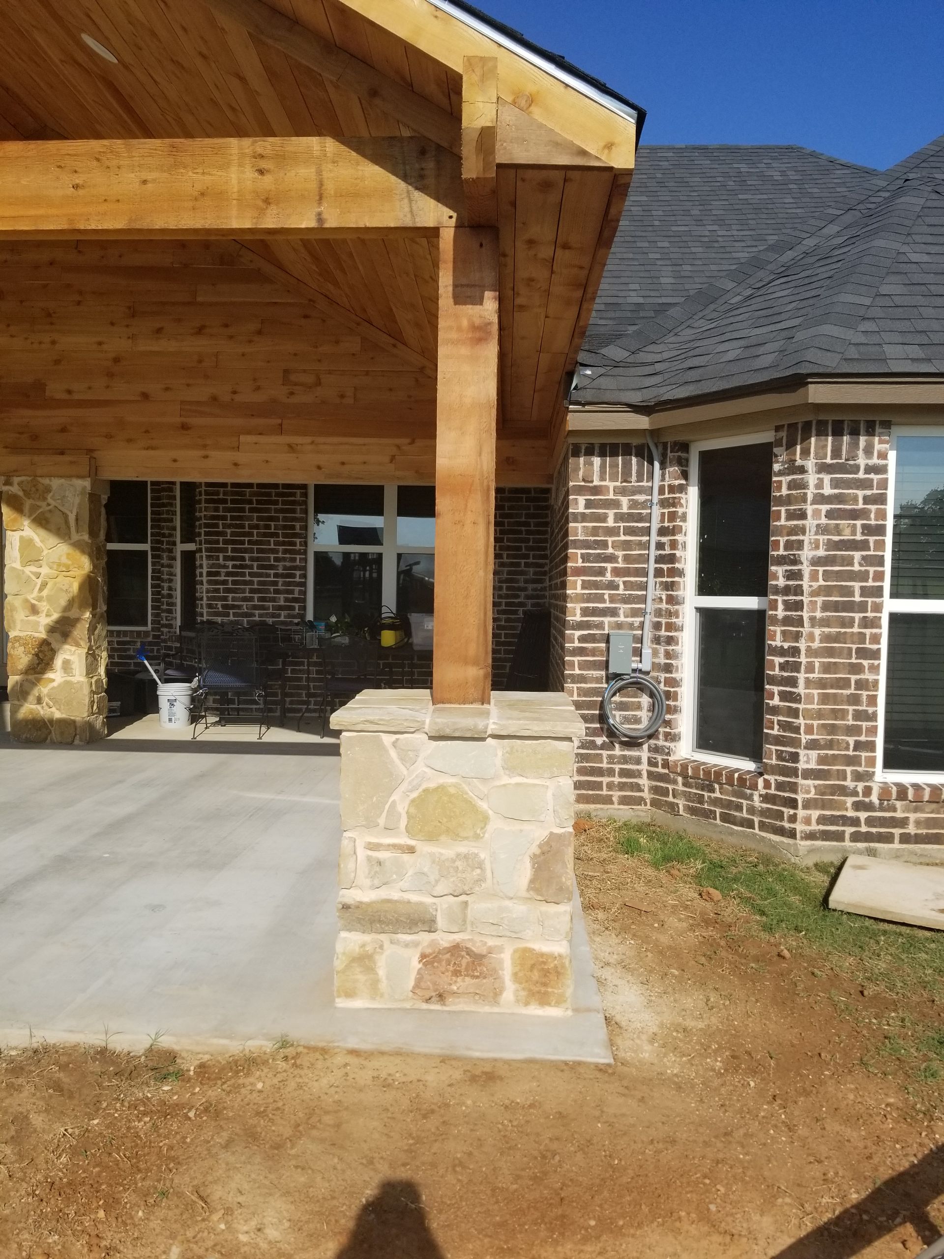 Patio cover with stone columns
