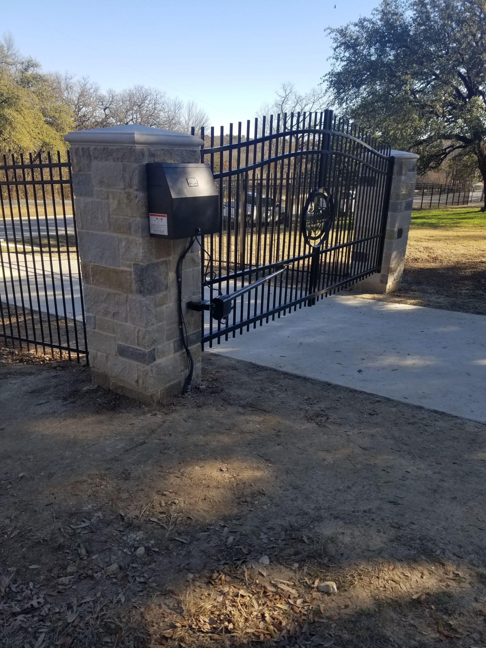 Iron gates and stone pillars