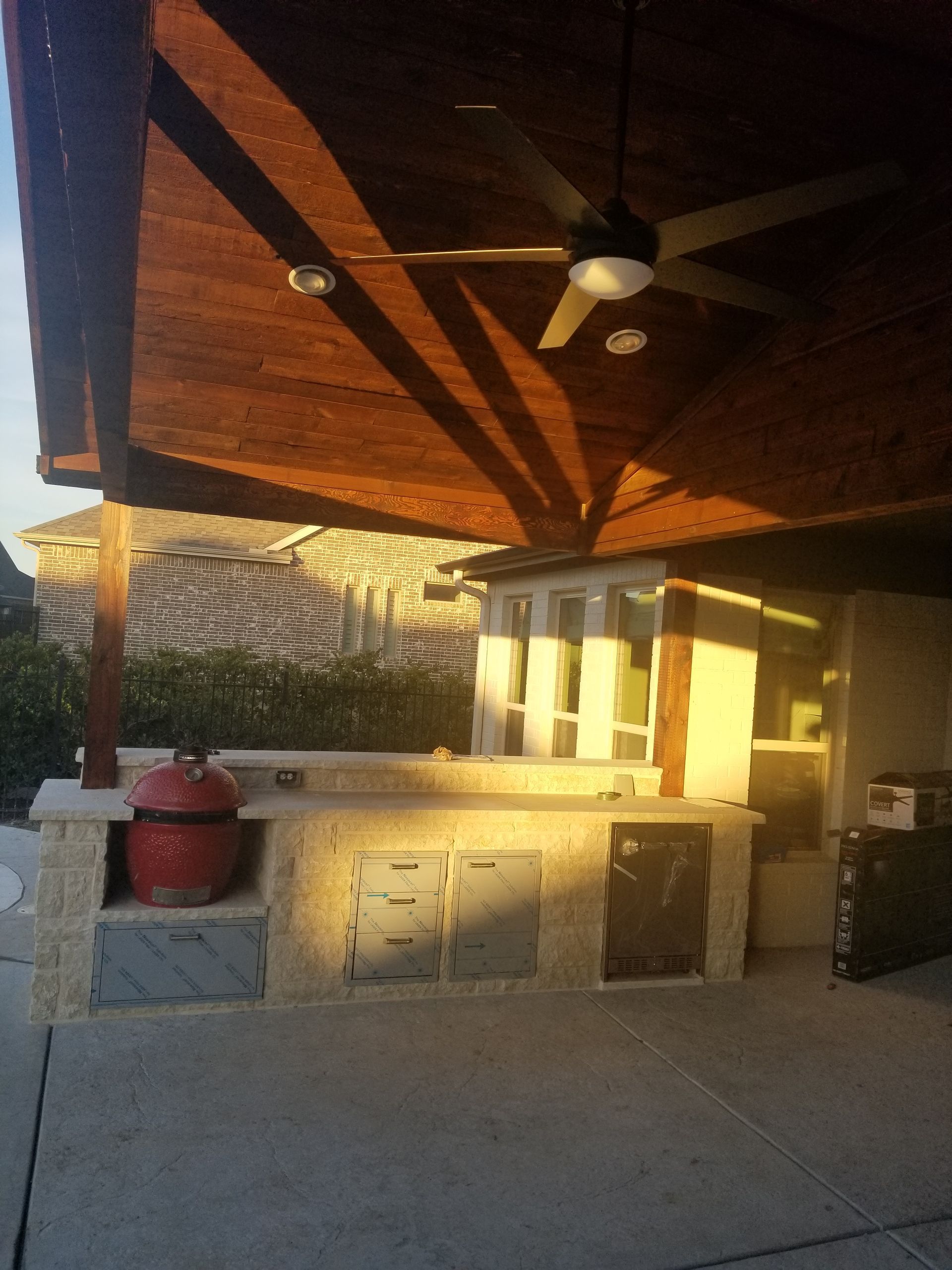 Outdoor grill and patio cover