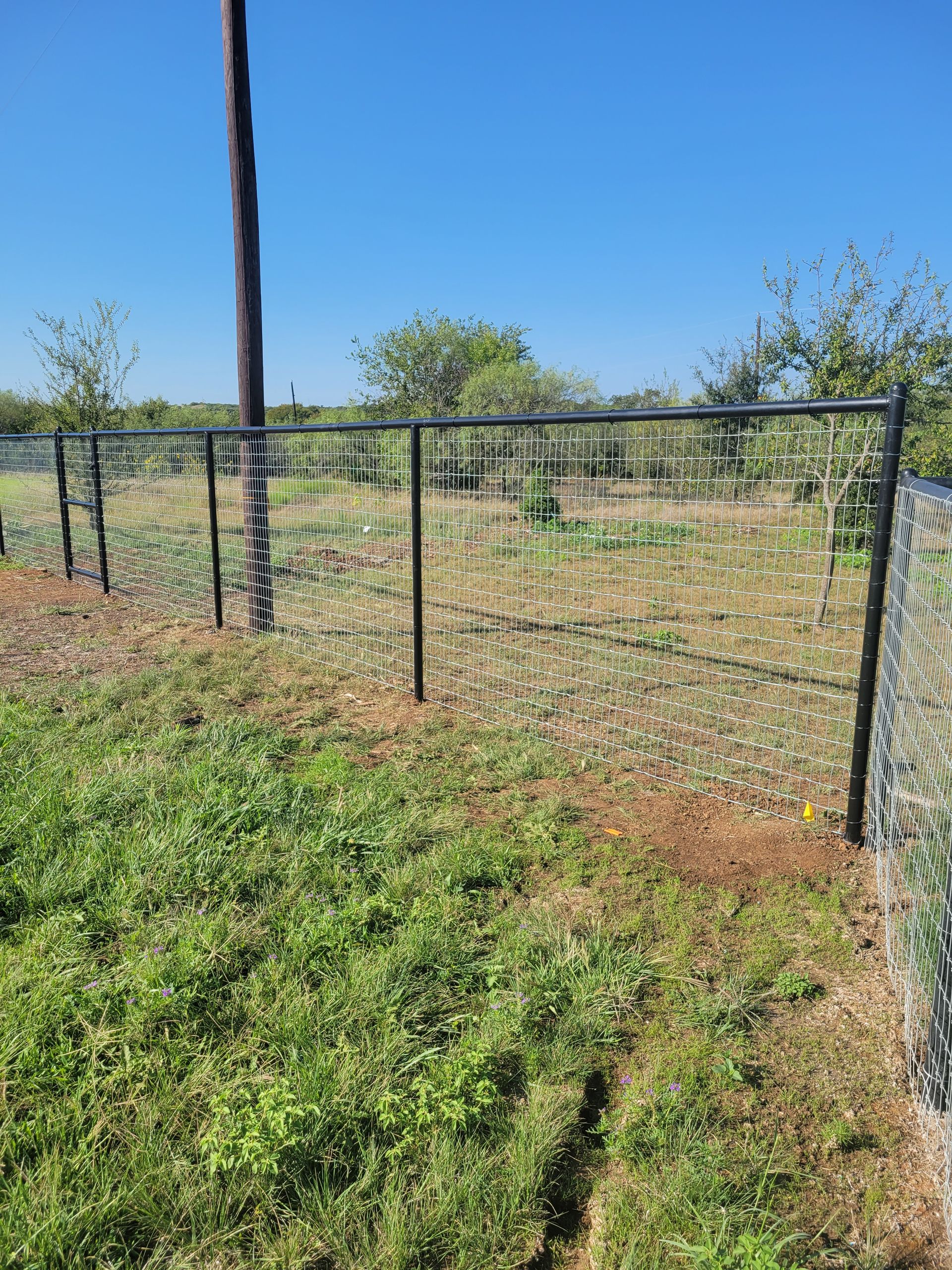 Pipe fence with no climb wire is a good choice for the ranch
