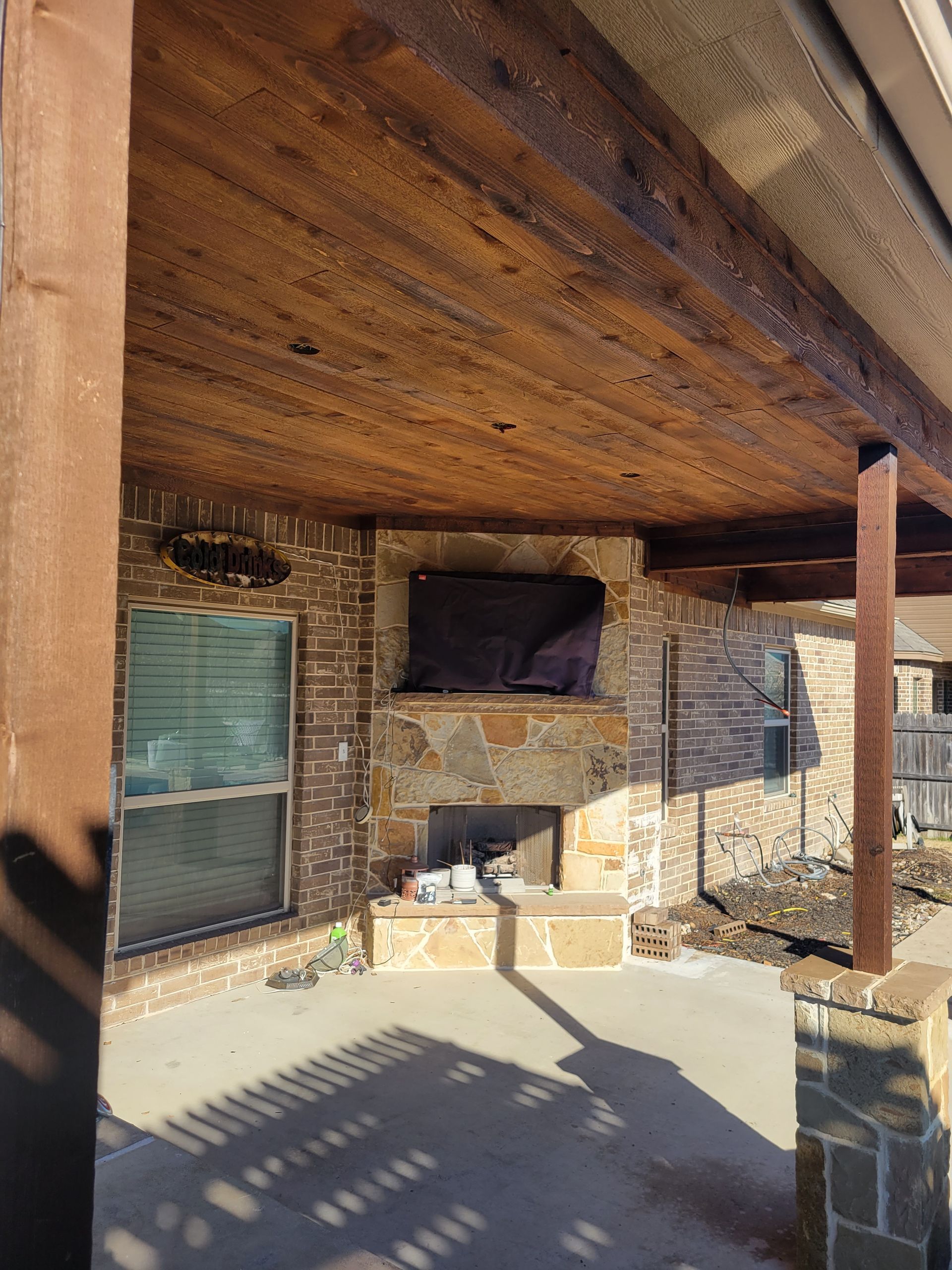 Stone fireplace with tv