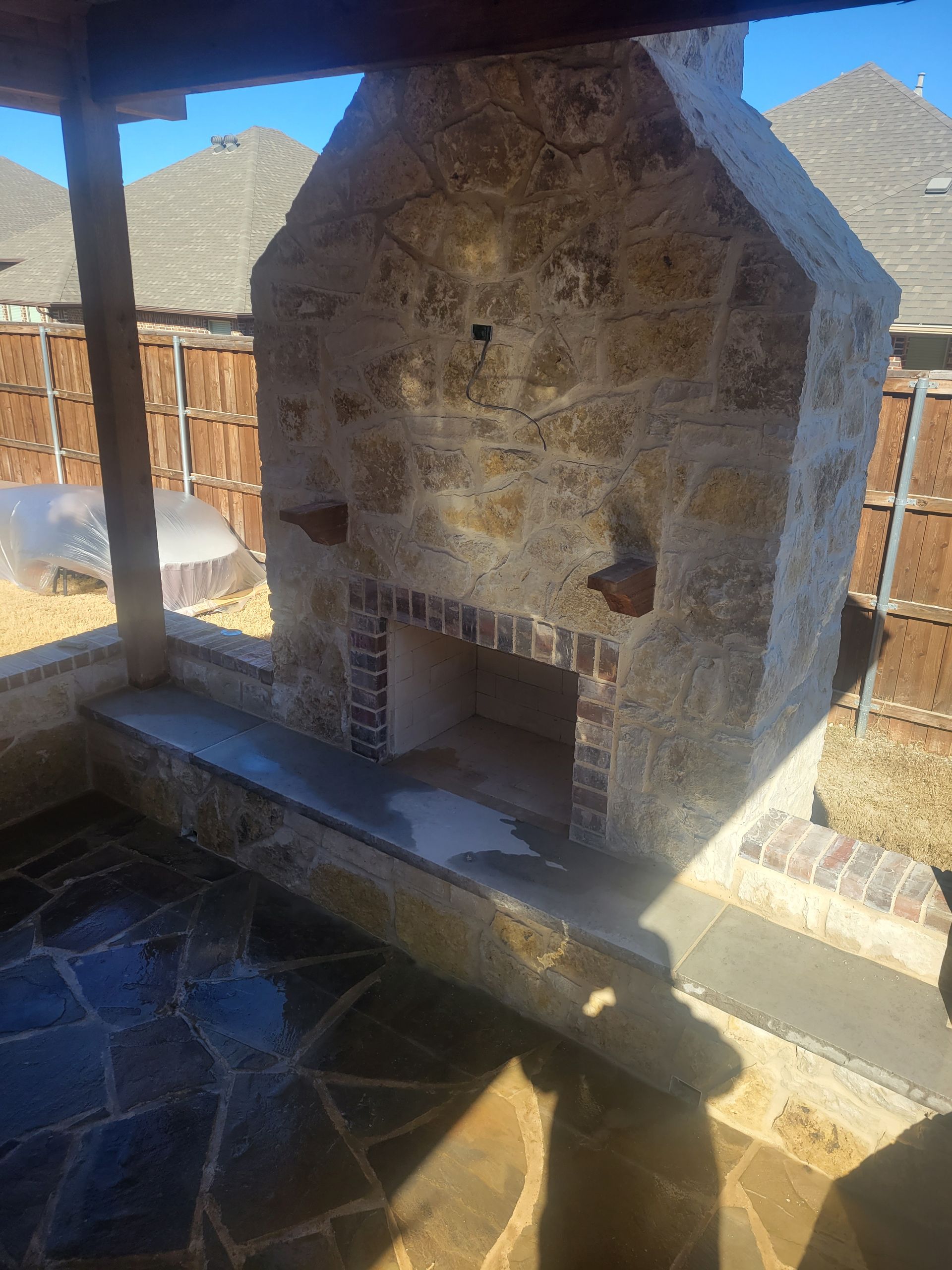 Stone wood burning fireplace