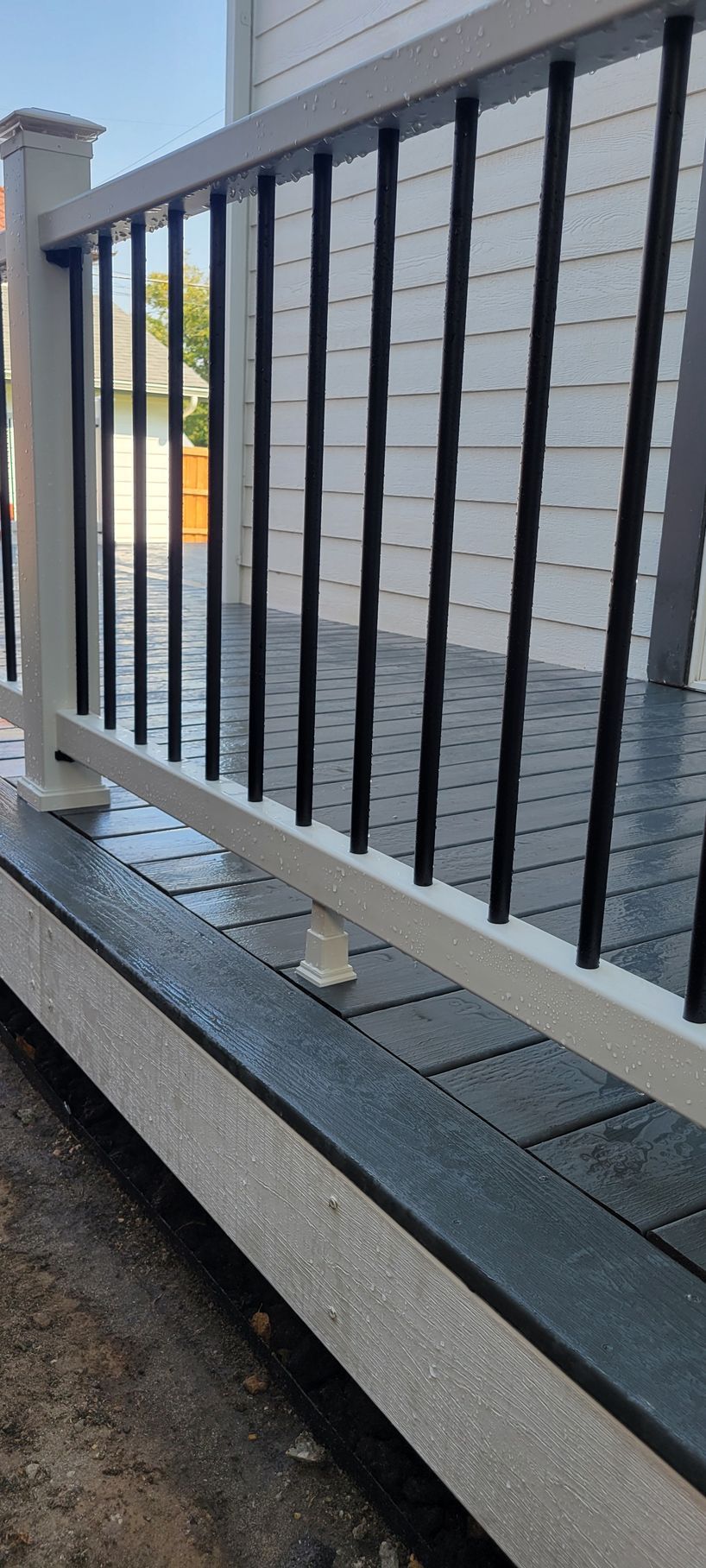 White railing and composite deck