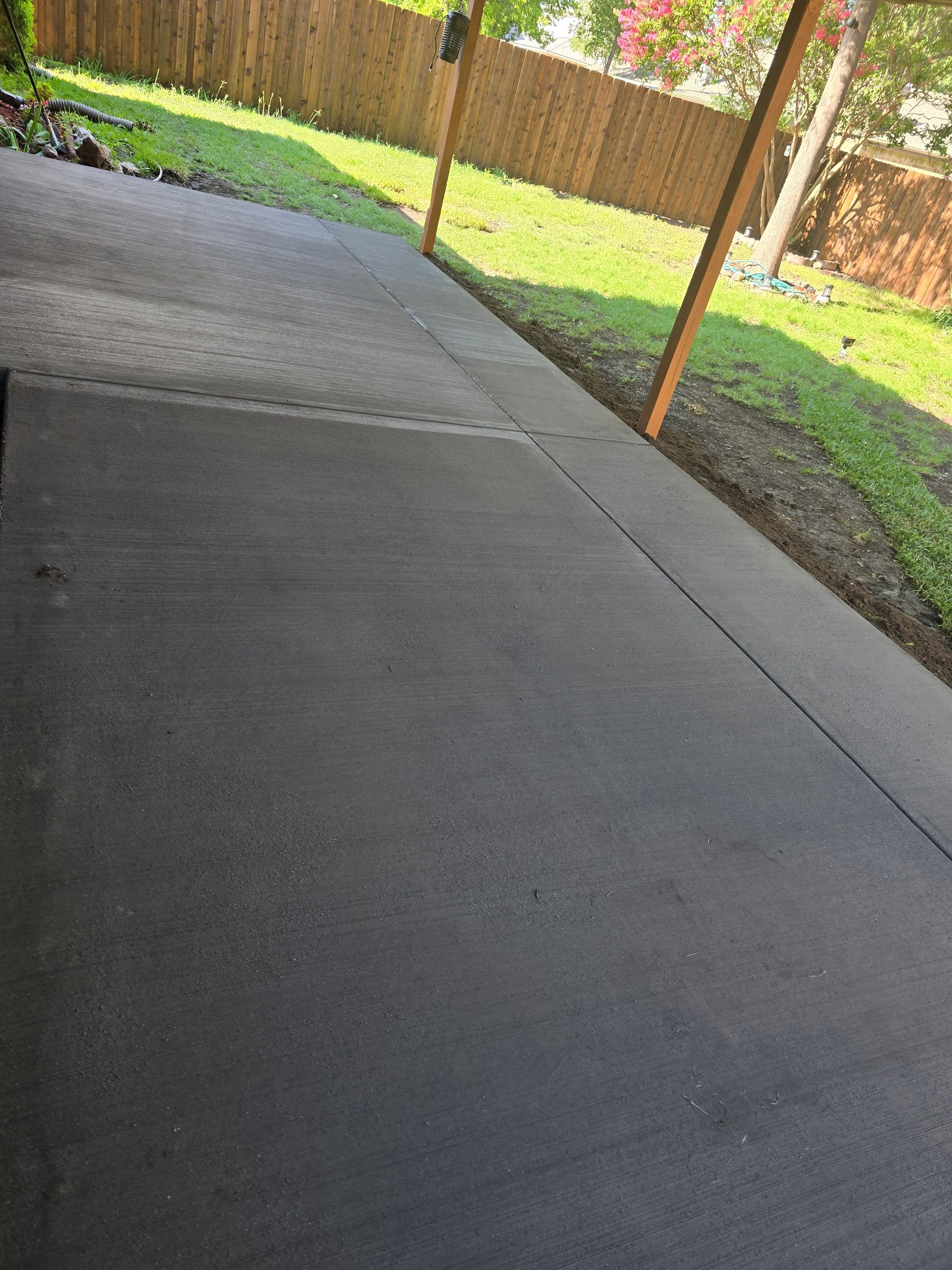 Brushed Broom Concrete patio in West Fort Worth