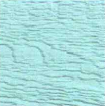 Light blue textured surface resembling wood grain.