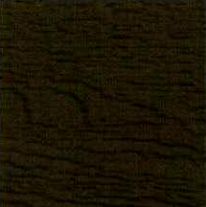 Close-up of dark brown wood grain, showing textured lines and varying shades of brown.