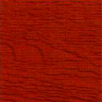 Red-stained wood grain, showing the texture and patterns of the wood fibers.