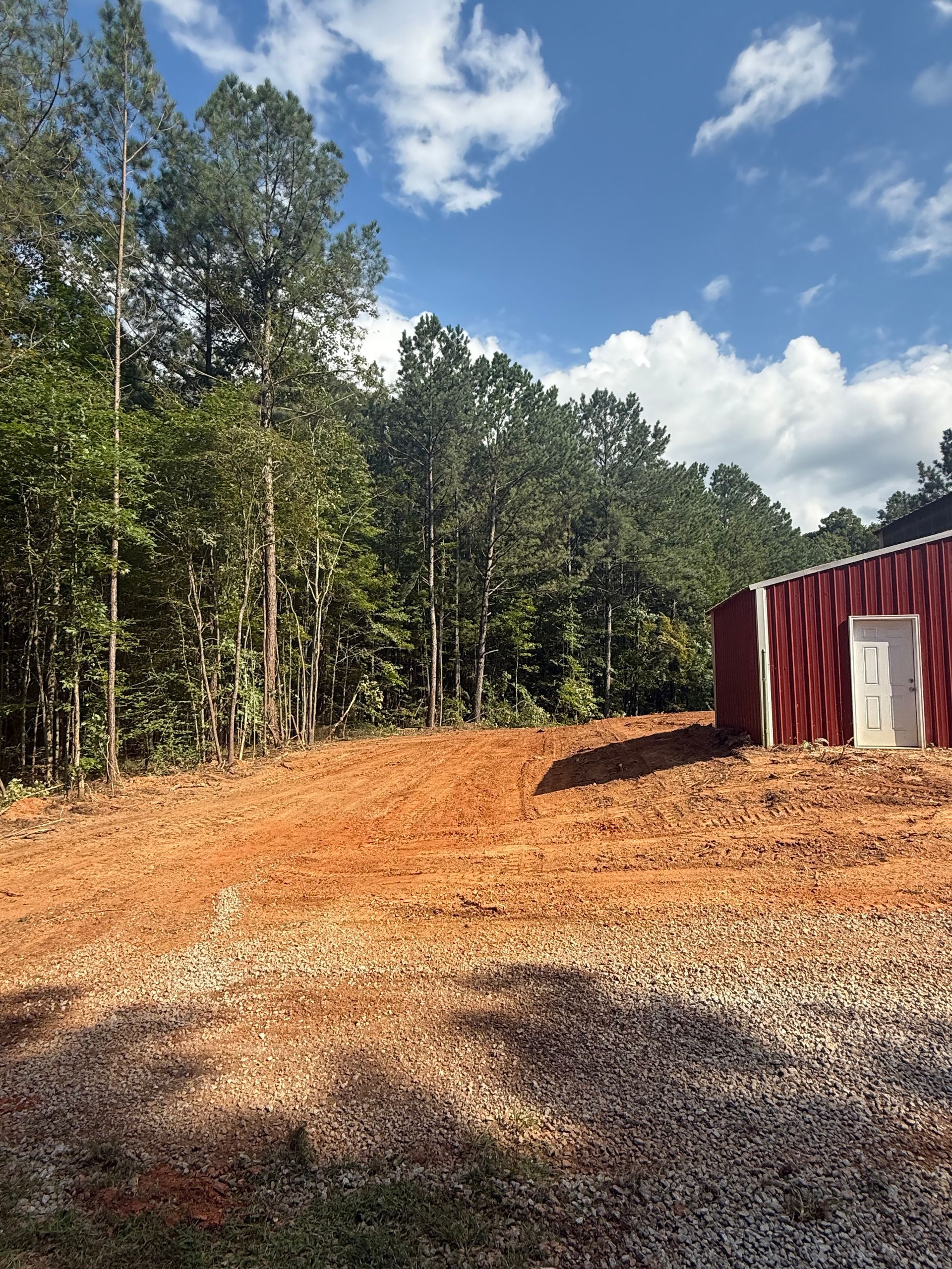 Family gathered at a dining table in a kitchen. They are eating and talking together.