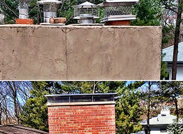 A brick chimney is being built on top of a roof.