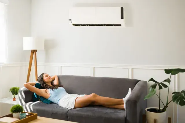 woman-resting-on-couch