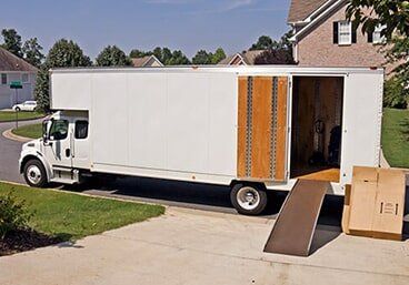Moving and storage truck Side View With Open Door — Moving Company in Altoona, PA