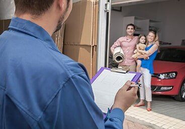Mover holding clipboard and invoice — Residential Movers in Altoona, PA