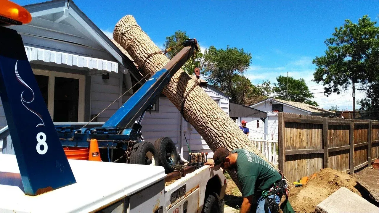 A tow truck has the number 8 on the back