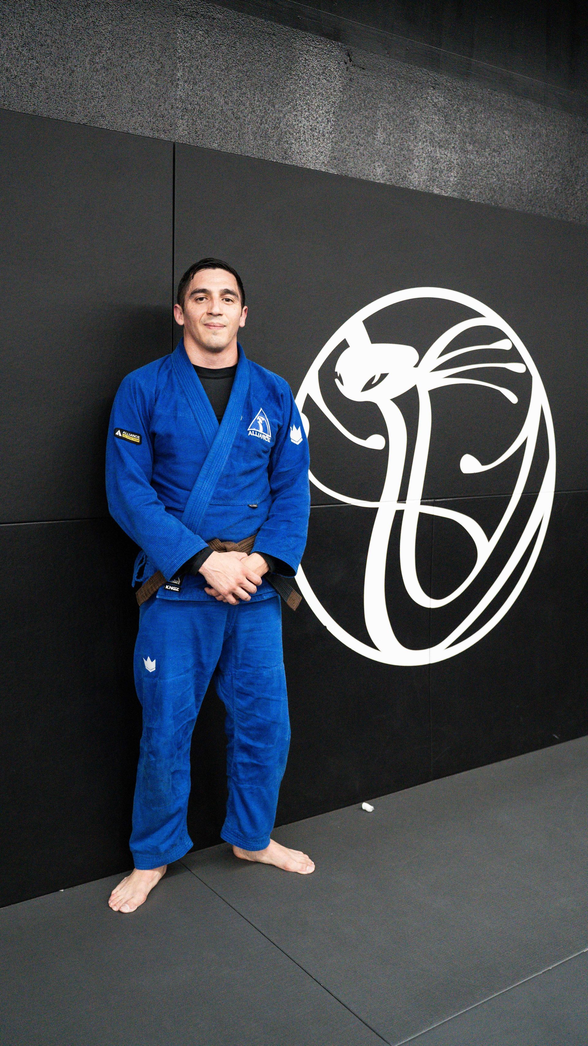 Kids and adults practicing Brazilian Jiu Jitsu at Cobrinha Southwest in Las Vegas, NV.