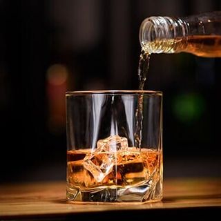 Whiskey Drink — Pour On Whiskey In To Glass in Worcester, MA
