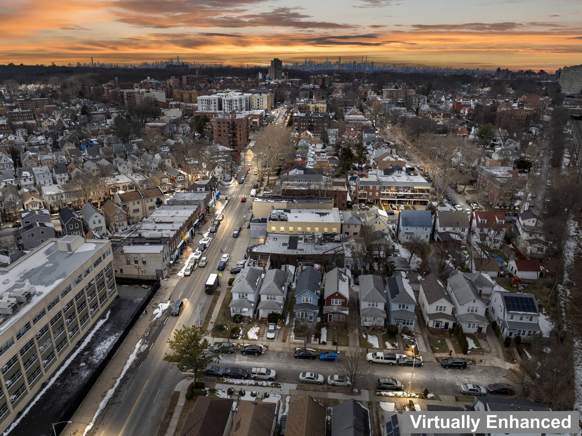 An aerial view of a city with the words virtually enhanced at the bottom